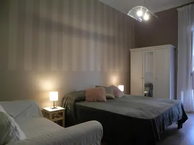 Letto o letti in una camera di CASA GORIZIA 63