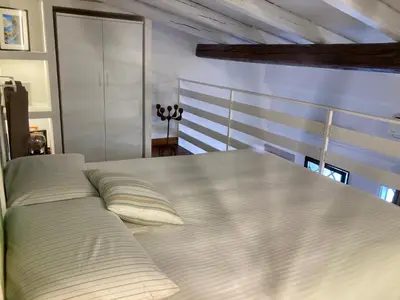 Letto o letti in una camera di Lavica Di Mezzo Apartments