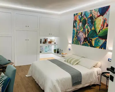 Letto o letti in una camera di Lavica Di Mezzo Apartments