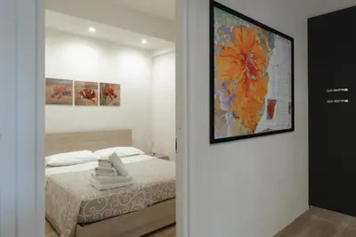Letto o letti in una camera di Aetna apartment