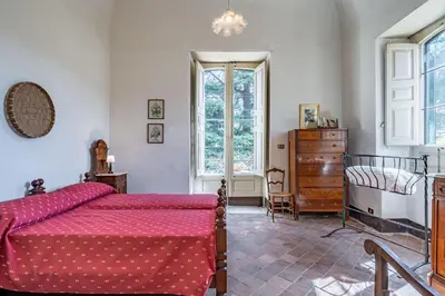 Letto o letti in una camera di GuestHost - Villa Ninina in the Heart of Etna Park