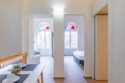 Letto o letti in una camera di GuestHost - Seaview Modern Apartment with Balcony