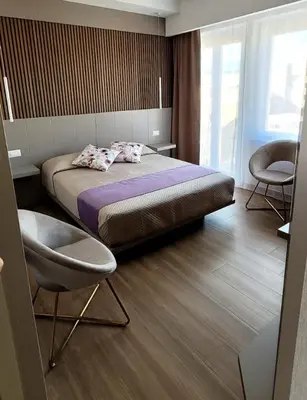 Letto o letti in una camera di Th Luxury Central