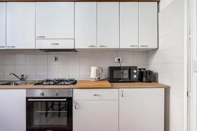 Cucina o angolo cottura di GuestHost - Corso Italia Central Flat near the Seafront