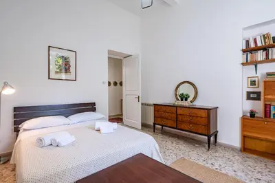 Letto o letti in una camera di GuestHost - Corso Italia Central Flat near the Seafront
