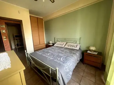 Letto o letti in una camera di VACANZE Da CINZIA