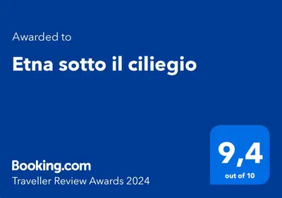 Certificato, attestato, insegna o altro documento esposto da Etna sotto il ciliegio