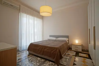 Letto o letti in una camera di Top Floor Aparthotel Bentivoglio 2