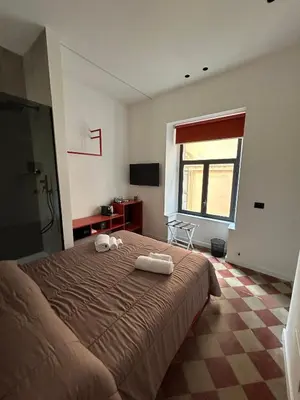 Letto o letti in una camera di Polpetthouse
