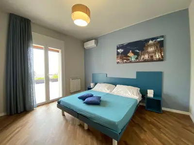 Letto o letti in una camera di La Finestra sui Faraglioni