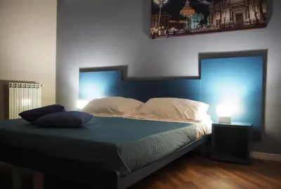 Letto o letti in una camera di La Finestra sui Faraglioni