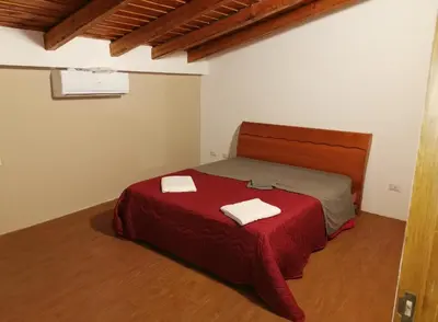 Letto o letti in una camera di Etnadia
