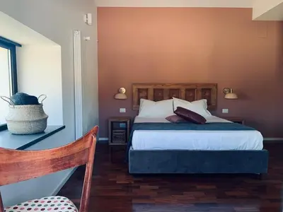 Letto o letti in una camera di PetraSicula Apartment