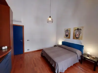 Letto o letti in una camera di Terrazza San Camillo