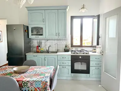Cucina o angolo cottura di Terrazza d'Amuri Santa Caterina