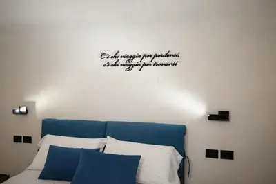 Letto o letti in una camera di MAZZINI PALACE