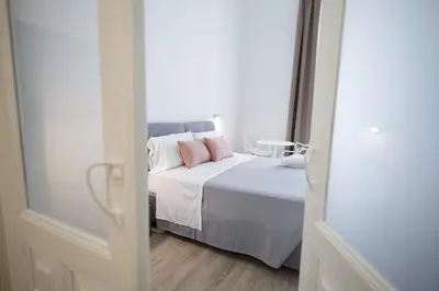 Letto o letti in una camera di MAZZINI PALACE