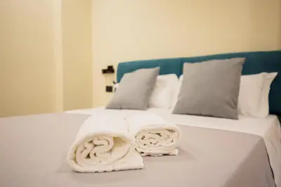 Letto o letti in una camera di MAZZINI PALACE
